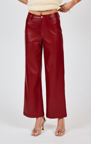 Upgrade your style game with Sadie & Sage's Night Vision faux leather pants. These pants will elevate any outfit, giving you a chic and edgy look while providing all-day comfort. Perfect for a night out or a day at the office. (We promise you'll feel like a rockstar in these!)