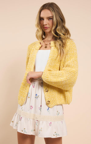 Stay chic and cozy with Sadie & Sage's Sunroof half button cardigan. Perfect for layering, this cardigan adds a touch of playfulness to any outfit. Keep the sun out and your style on point with Sunroof!