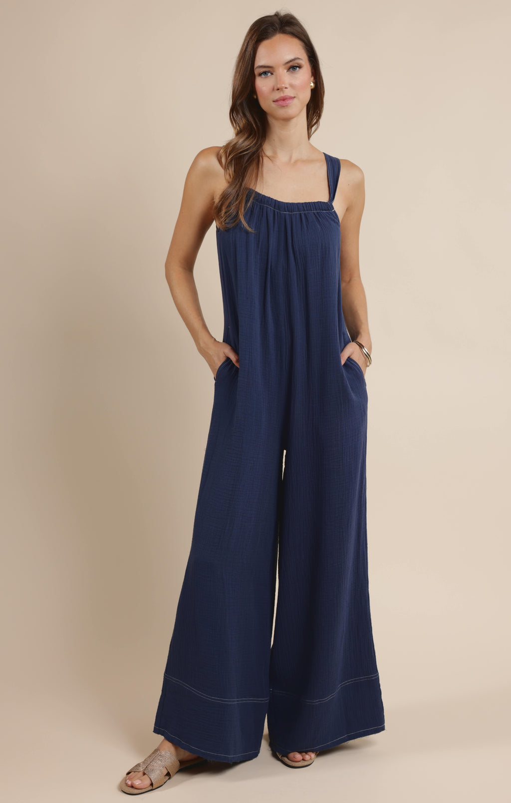 Introducing the Breezy Lane jumpsuit from Sage the Label! This trendy frayed hem jumpsuit will have you feeling effortlessly chic. Perfect for a day out with friends or a date night, this jumpsuit is a must-have for any fashion-forward individual. Upgrade your wardrobe with Breezy Lane!