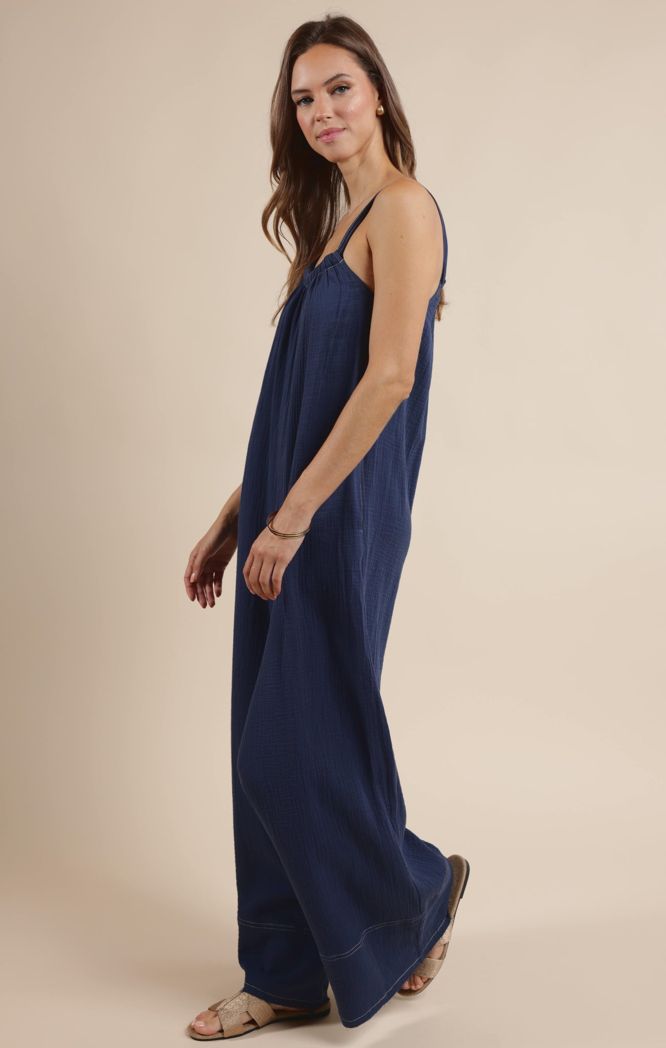 Introducing the Breezy Lane jumpsuit from Sage the Label! This trendy frayed hem jumpsuit will have you feeling effortlessly chic. Perfect for a day out with friends or a date night, this jumpsuit is a must-have for any fashion-forward individual. Upgrade your wardrobe with Breezy Lane!