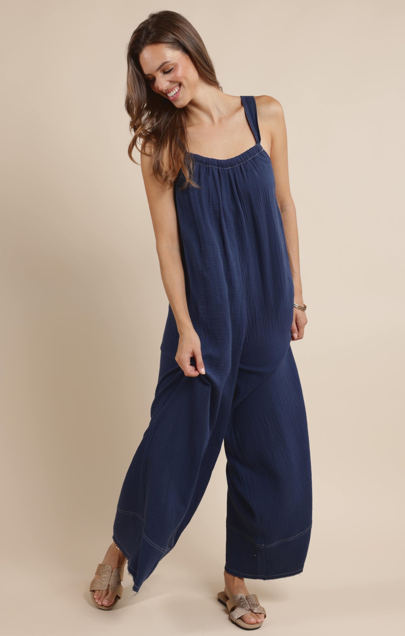 Introducing the Breezy Lane jumpsuit from Sage the Label! This trendy frayed hem jumpsuit will have you feeling effortlessly chic. Perfect for a day out with friends or a date night, this jumpsuit is a must-have for any fashion-forward individual. Upgrade your wardrobe with Breezy Lane!