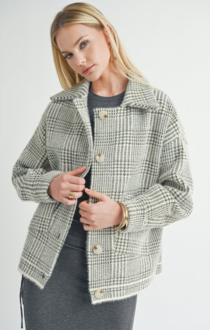 Stay stylish and cozy with Sage the Label's trendy Lola plaid sweater jacket. This playful jacket will add character to any outfit, while keeping you warm and comfortable. Don't sacrifice style for warmth - get the best of both worlds with Lola!