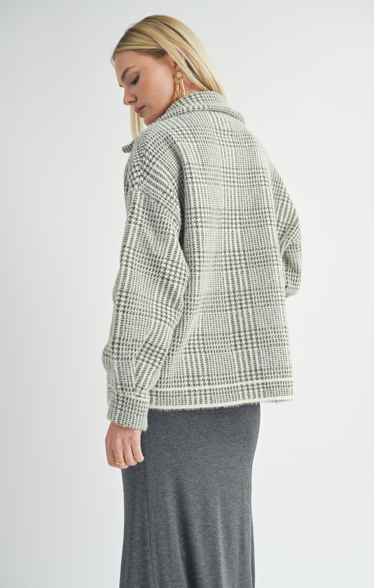 Stay stylish and cozy with Sage the Label's trendy Lola plaid sweater jacket. This playful jacket will add character to any outfit, while keeping you warm and comfortable. Don't sacrifice style for warmth - get the best of both worlds with Lola!