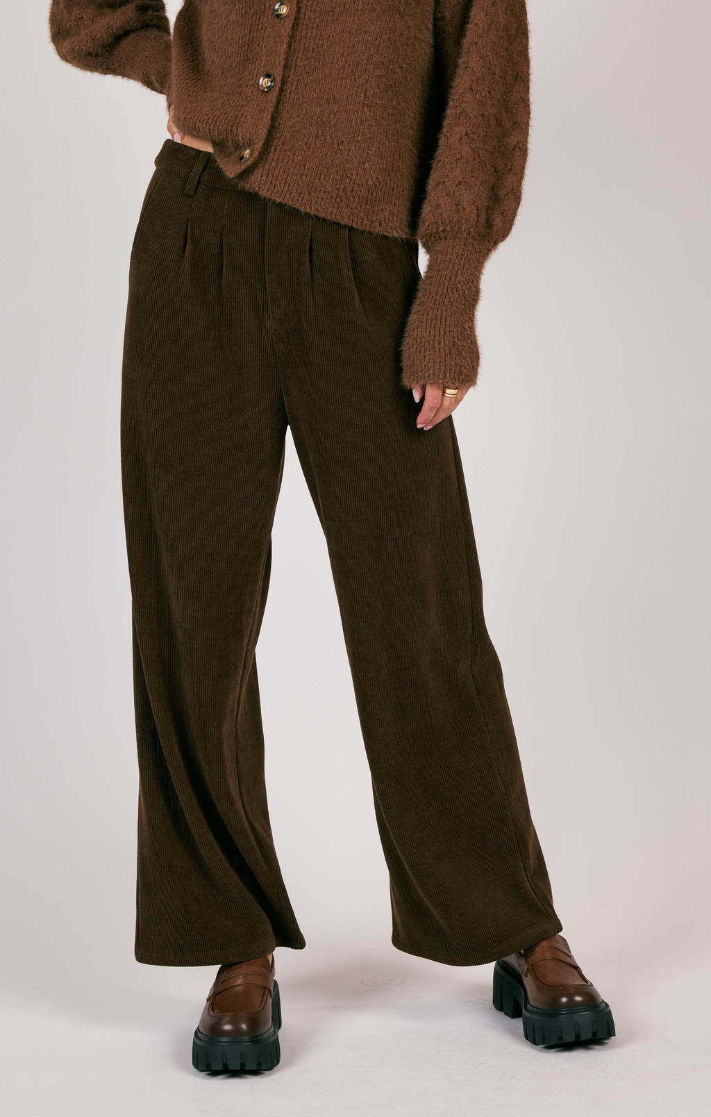 The Sage the Label Paradox Pant is the ultimate corduroy pant, adding a touch of texture to any outfit. Its versatile and durable material provides both style and comfort, making it a must-have addition to your wardrobe. Get ready to elevate your fashion game with these statement-making pants!