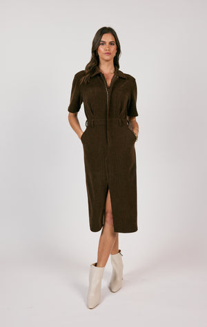 Unleash your paradoxical side with the Sage the Label cord shirt midi dress. This playful piece offers a unique twist on the classic shirt dress, making it a versatile addition to your wardrobe. Perfect for both work and play, it effortlessly combines comfort and style.