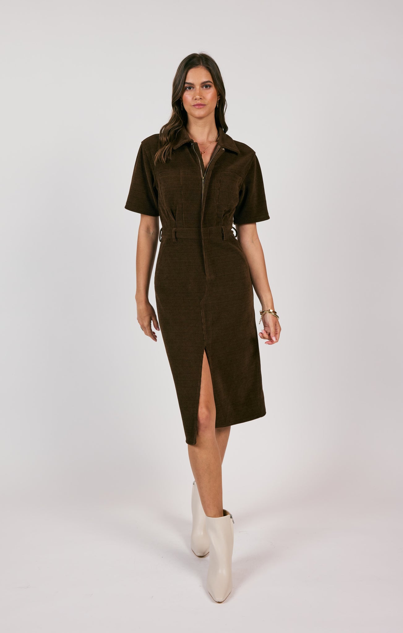 Unleash your paradoxical side with the Sage the Label cord shirt midi dress. This playful piece offers a unique twist on the classic shirt dress, making it a versatile addition to your wardrobe. Perfect for both work and play, it effortlessly combines comfort and style.