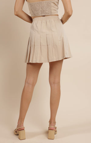 Unleash your quiet moments in style with Sage the Label's pleated mini skirt. This skirt adds a playful touch to your wardrobe while accentuating your figure. Perfect for any occasion, it pairs well with any top for a quirky and fun look.
