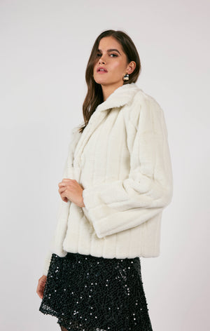 Wrap yourself in star-worthy style with this faux fur jacket from Sage The Label! Perfect for chilly nights out on the town, this jacket will keep you cozy and stylish. No need to be a celebrity to feel like a star. (Plus, it's cruelty-free!)