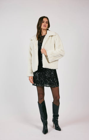 Wrap yourself in star-worthy style with this faux fur jacket from Sage The Label! Perfect for chilly nights out on the town, this jacket will keep you cozy and stylish. No need to be a celebrity to feel like a star. (Plus, it's cruelty-free!)