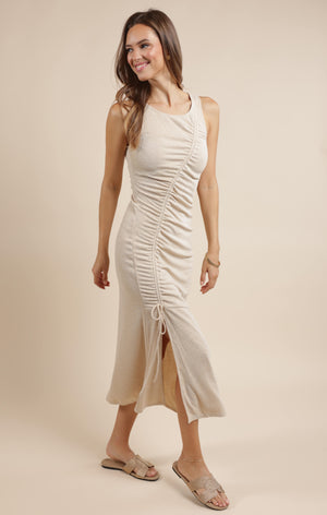 Stay awhile in this ruched knit dress from Sage the Label. Perfect for any occasion, the form-flattering design will keep you comfortable and stylish. No need to rush, this dress is here to stay (awhile)!