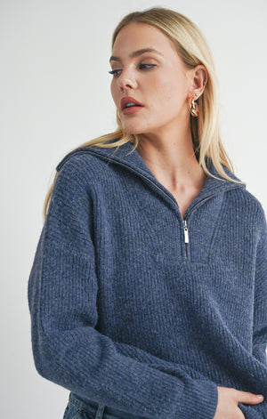 Introducing Suzy, the half zip sweater from Sage the Label. Stay warm and stylish with this quirky and playful sweater, perfect for any casual occasion. Don't zip up the boring sweater routine, zip up Suzy!