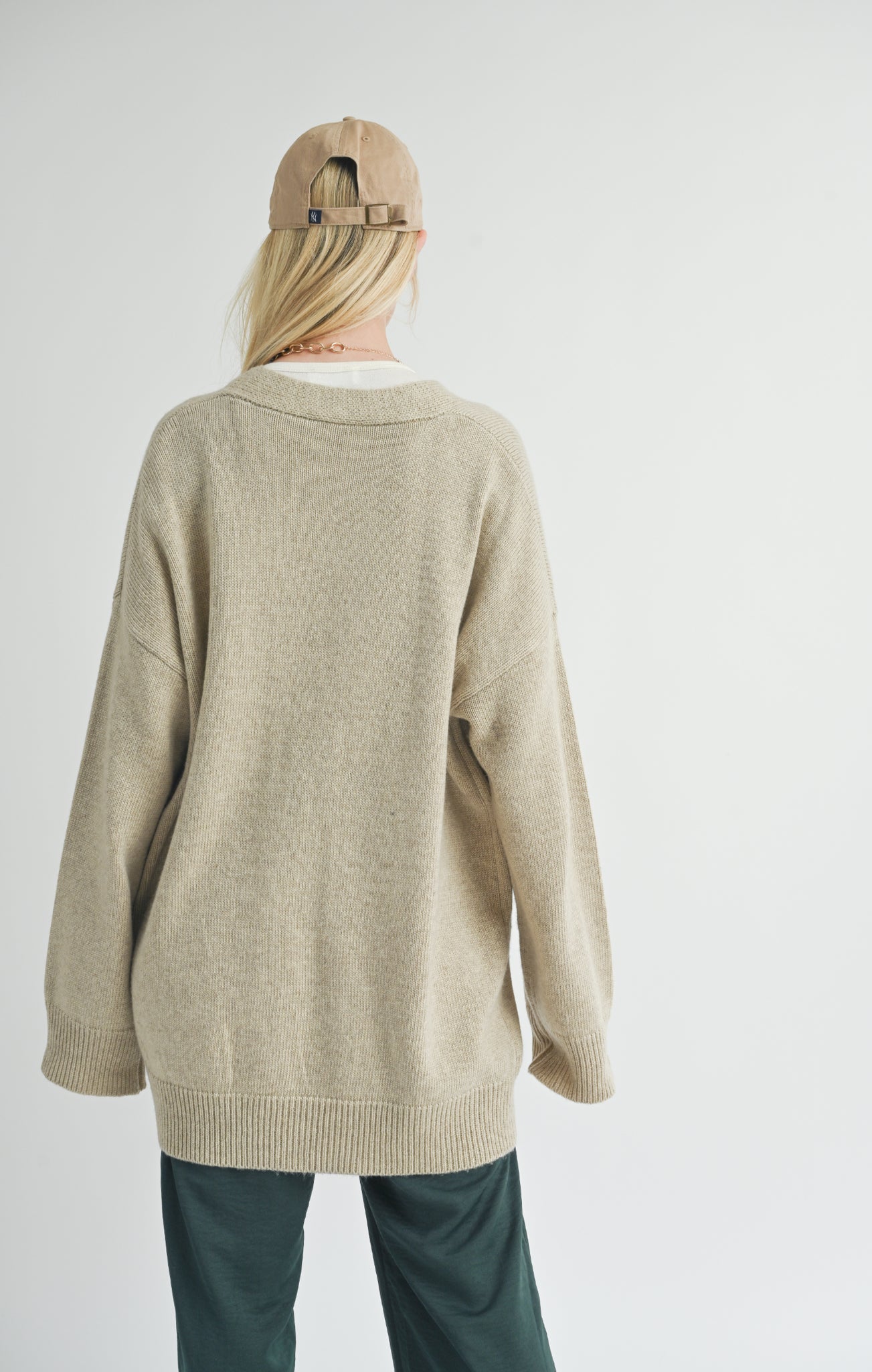 Introducing Sydney, the oversized cardigan from Sage the Label! Keep cozy in style with this whimsical knit piece. Perfect for layering or wearing on its own, Sydney will have you looking effortlessly chic. Say goodbye to boring cardigans and hello to playful fashion.