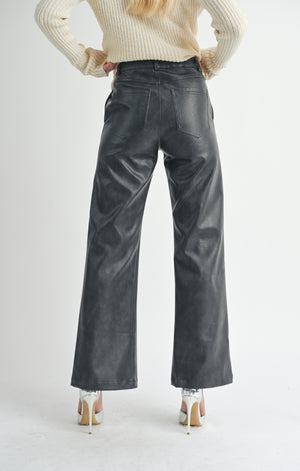 Unleash your inner rebel with Sage the Label's seamed vegan leather pants! These edgy pants are sure to make a statement while also being ethically conscious. Say goodbye to boring trousers and hello to a bold fashion choice.