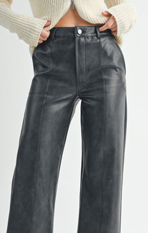 Unleash your inner rebel with Sage the Label's seamed vegan leather pants! These edgy pants are sure to make a statement while also being ethically conscious. Say goodbye to boring trousers and hello to a bold fashion choice.