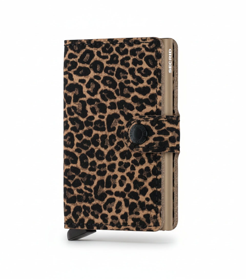 A leopard print mini wallet with a Secrid logo on the side.