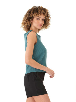 This sleeveless crewneck tank is crafted from soft, ribbed knit fabric for a sleek, comfy feel. A timeless essential, it's perfect for layering or wearing solo for an effortlessly polished look.