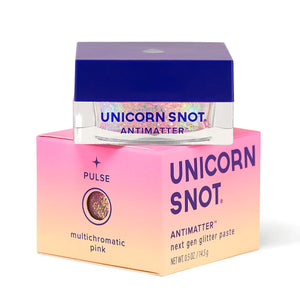 Jar of 'Unicorn Snot' Antimatter glitter paste with pink and purple packaging on a white background
