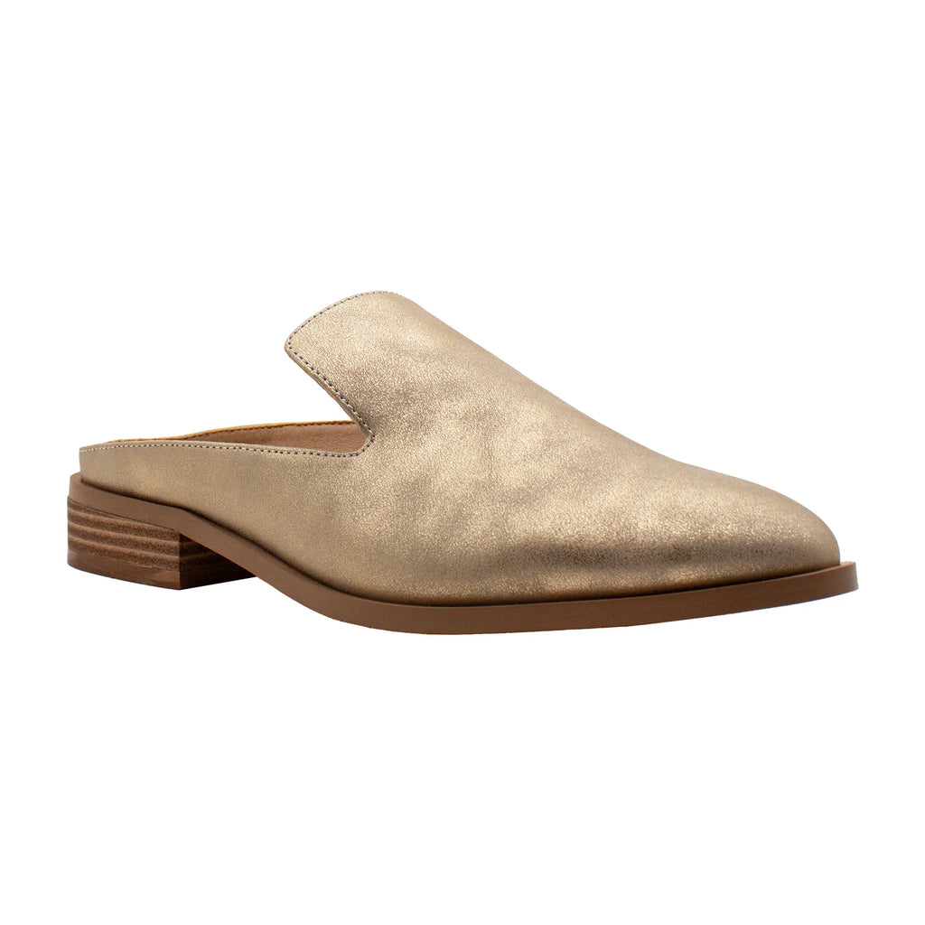 Gold slip-on shoe with a wooden sole on a white background