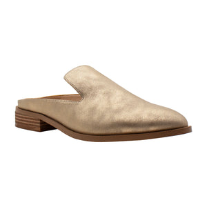 Gold slip-on shoe with a wooden sole on a white background