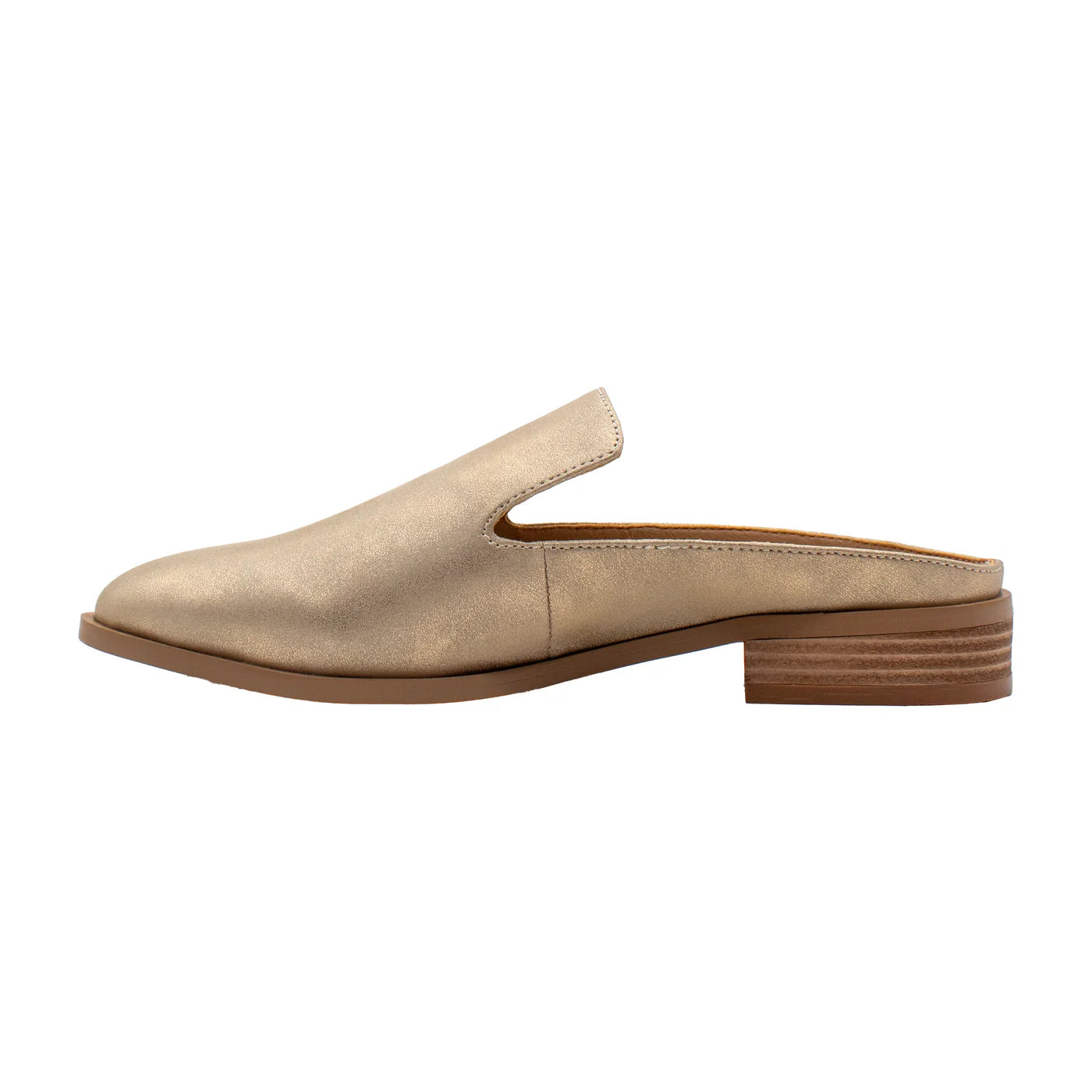 Beige slip-on shoe with a brown sole on a white background