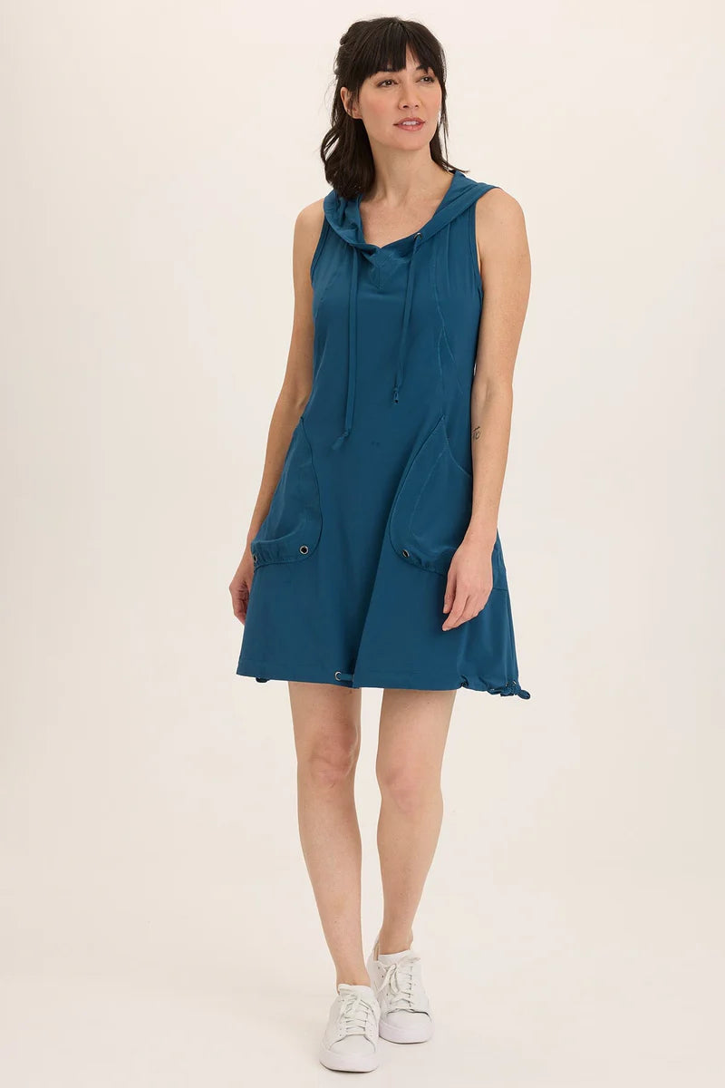 Woman wearing a blue dress on a white background