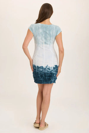 This stretch poplin dress features short sleeves, ruching on skirt, jersey inserts in the bodice for an impeccable fit, and style lines for added structure.