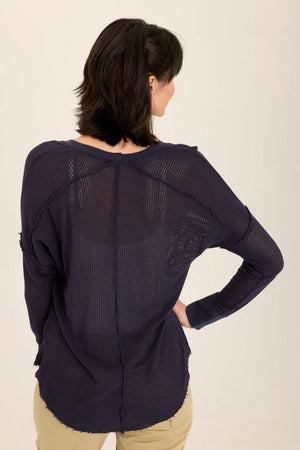 An exaggerated V-neck teams up with a drop shoulder look in our latest sweatshirt-like pullover. An airy mesh and rib details make Bullock oh-so-comfy and classy!
