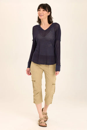 An exaggerated V-neck teams up with a drop shoulder look in our latest sweatshirt-like pullover. An airy mesh and rib details make Bullock oh-so-comfy and classy!