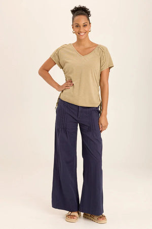 Cinchable side cords grace this&nbsp;v-neck slub jersey top; also featuring a front yoke, dolman sleeves, and raw-edge details throughout.