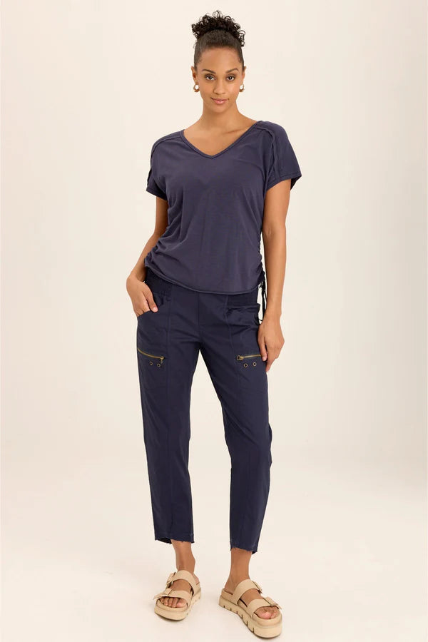 Cinchable side cords grace this v-neck slub jersey top; also featuring a front yoke, dolman sleeves, and raw-edge details throughout.