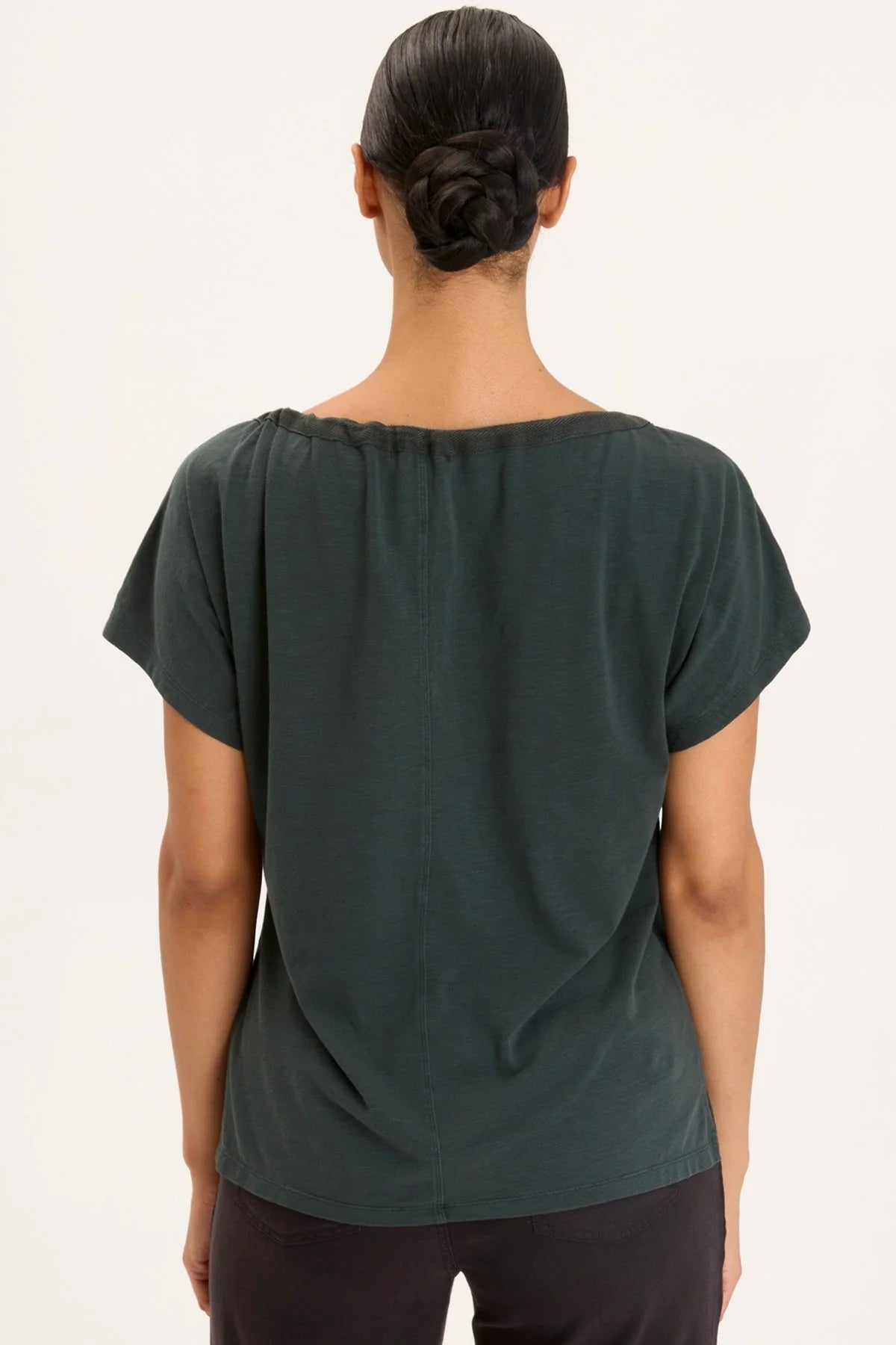 A cinchable, adjustable drawstring neckline offers the unique opportunity to wear Exelda off the shoulder or on. A slightly boxy fit keeps things casual and cute, while stretch jersey ensures ultimate comfort.