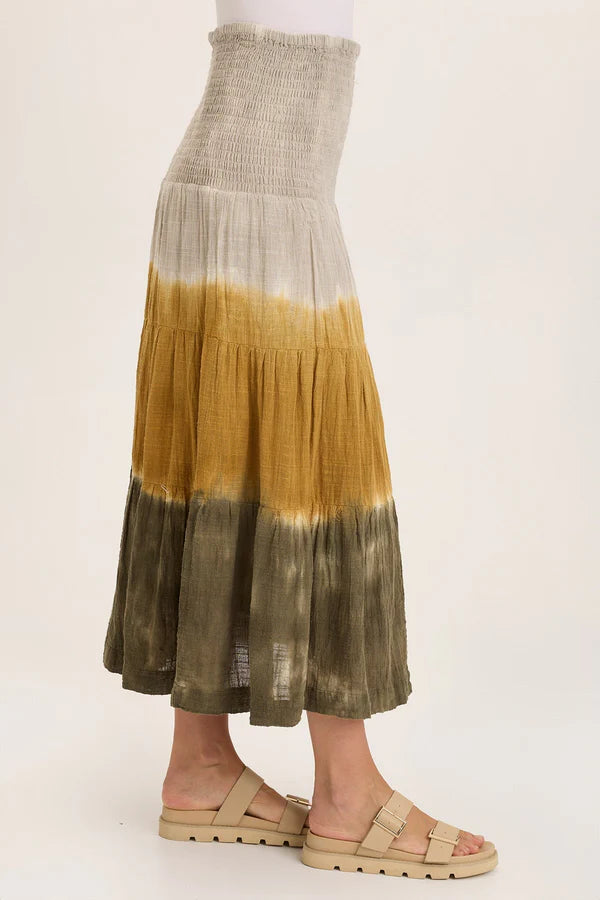 Skirt with a gradient pattern from green to yellow on a white background