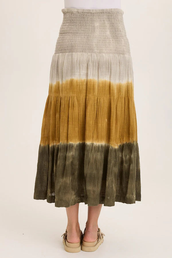 Skirt with gradient design from beige to brown on a white background