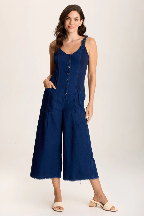 Indigo Twill offers a mock-denim look on this one-and-done ensemble, featuring cropped wide legs with a raw-edge hem, pockets at the front hips, adjustable overall straps, and ring snap-up closure.