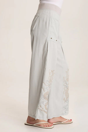 Phenomenal Pheodora is adorned with a hand drawn embroidery from our guest designer Nadia, featuring small pleats and a pull-on waist, this wide leg has major flare!