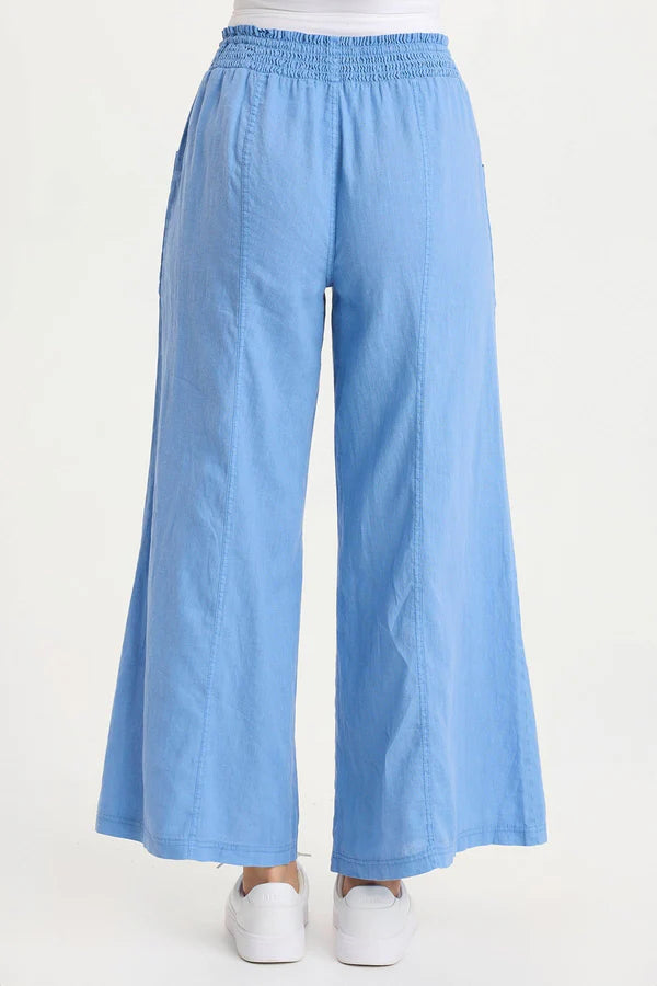 Light blue wide-leg pants on a white background