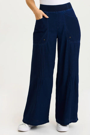 Navy blue wide-leg pants worn by a person on a white background