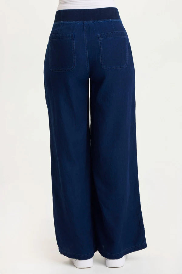 Navy blue wide-leg pants on a white background