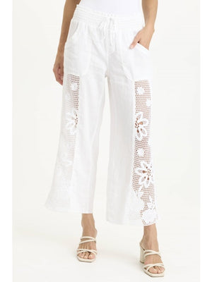 Step into effortless style with the XCVI Rokel wide-leg pants, featuring charming crochet side panels that add a touch of whimsy to your look. These breezy pants combine comfort and flair, perfect for playful days and relaxed evenings alike.