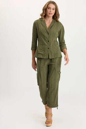 Woman wearing a green outfit on a white background