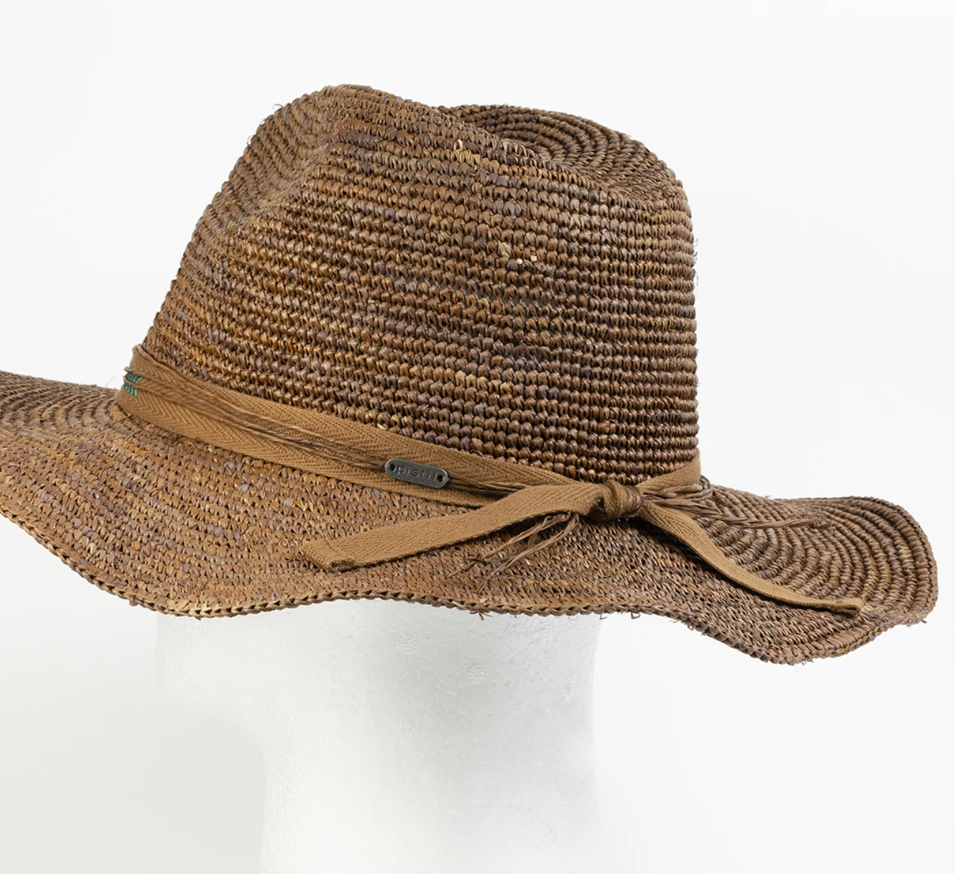 The Janis is made of crochet-weave raffia with a soft, pliable feel. This women's sun hat features a soft elastic inner band for a gentle, comfortable fit. The bendable brim lets you wear it flat or scrunched up, cowgirl-style.