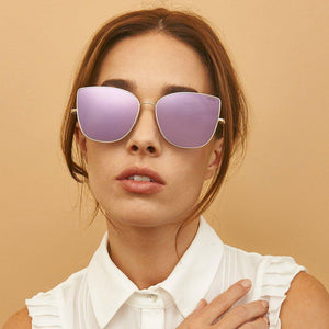 Slightly futuristic, yet perfectly wearable squared cat eye sunglasses that will sure to draw the attention.