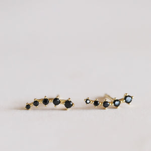 Our newest addition, these five-stone cascading crawlers feature Black cubic zirconia set in 18k gold-plated sterling silver.